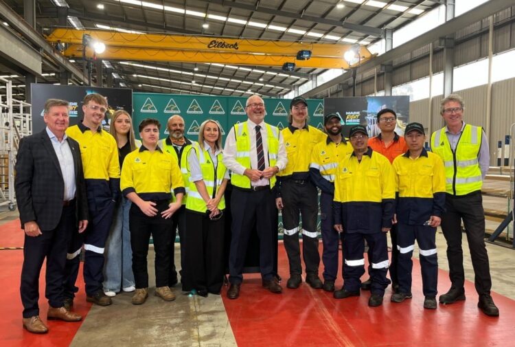Minster Tim Ayres with Capral Managing Director and CEO, Tony Dragicevich, and members of Capral's Smithfield team. Image: Capral.